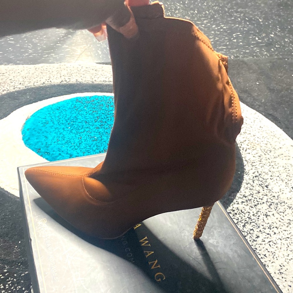 Brown boot with studded heel 6inch heel zips on the side
